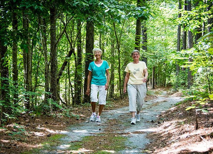 two ladies on walking trails
